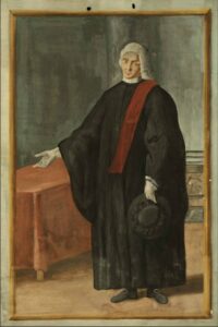 disegno d'archivio raffigurante un gonfaloniere del '600, che indossa una tonaca scura, guanti e parrucca. In mano ha un cappello con guarnizioni.