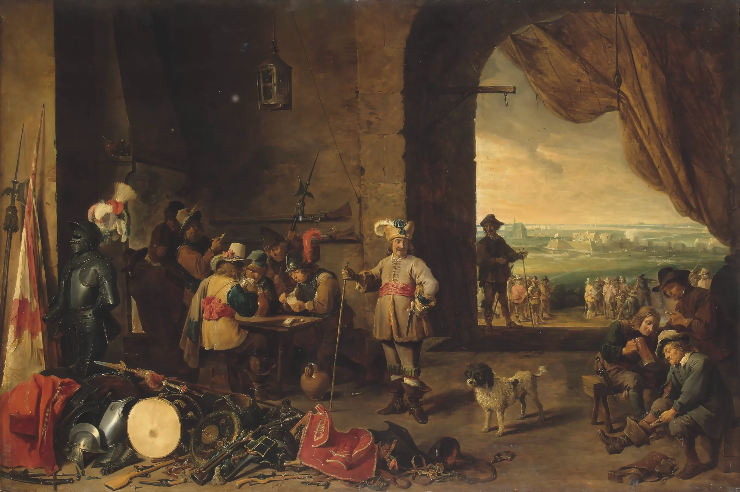 disegno di un gruppo di soltati in abiti seicenteschi all'interno di una fortezza. Alcuni sono seduti ad un tavolo, altri si stanno vestendo. Per terra c'è un mucchio di armature, armi, alcune bandiere e drappi, un cane. Sullo sfondo una fortificazione alla moderna